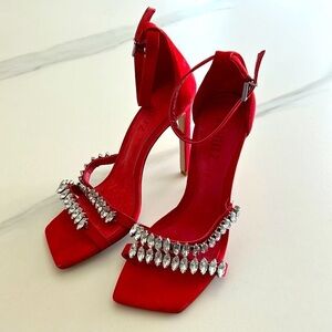 SCHUTZ Red Heels with Silver Accents